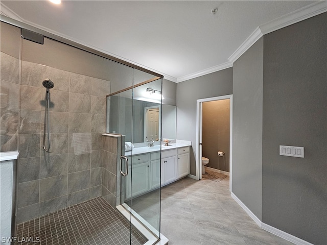 bathroom with crown molding, vanity, an enclosed shower, and toilet