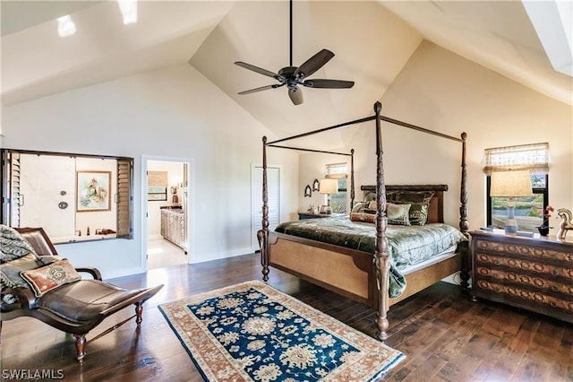 bedroom featuring high vaulted ceiling, ceiling fan, dark wood-type flooring, and connected bathroom