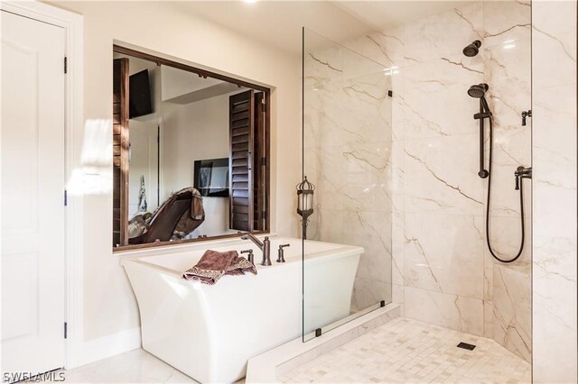 bathroom with tile patterned floors and plus walk in shower