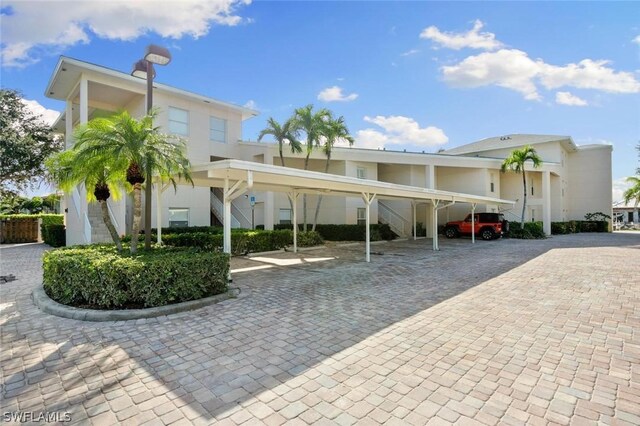 view of parking featuring a carport