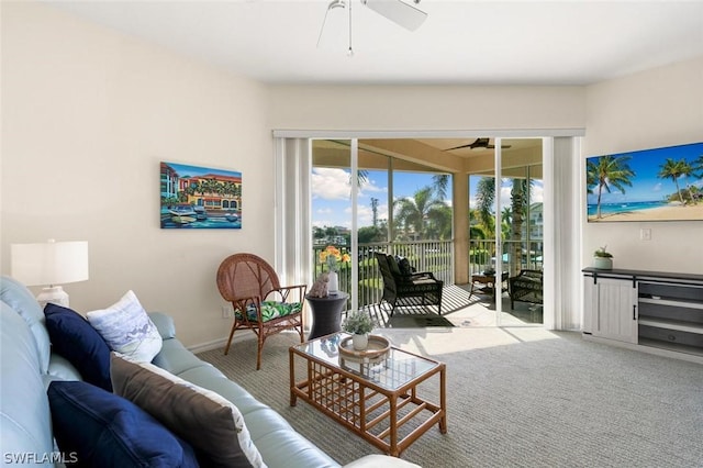 carpeted living room featuring ceiling fan