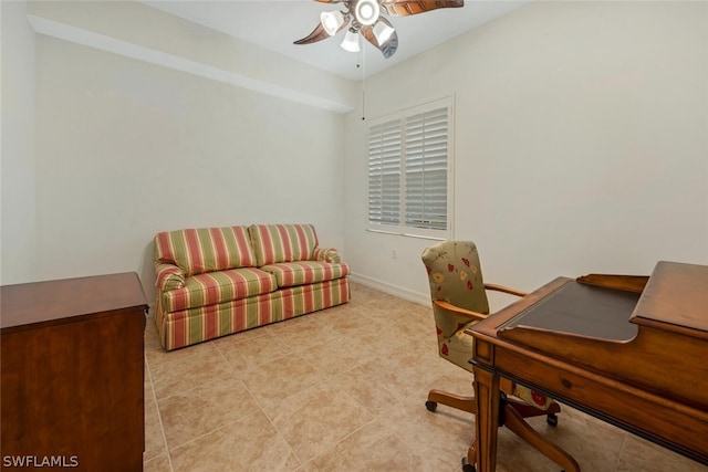 office space with ceiling fan and light tile patterned flooring