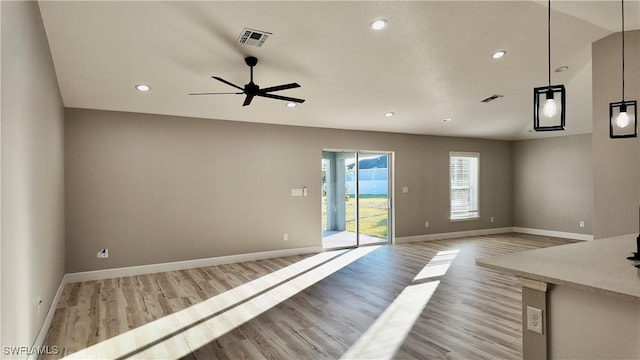 interior space featuring light hardwood / wood-style flooring and ceiling fan