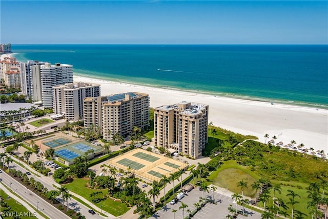 aerial view with a view of the beach and a water view