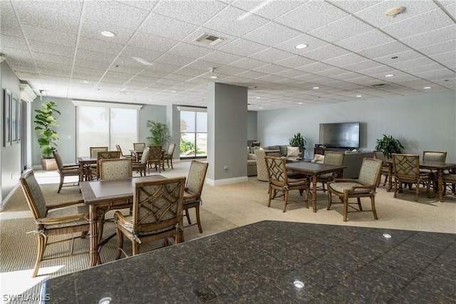 view of carpeted dining space