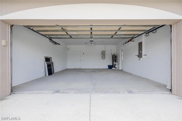 garage with electric panel and water heater