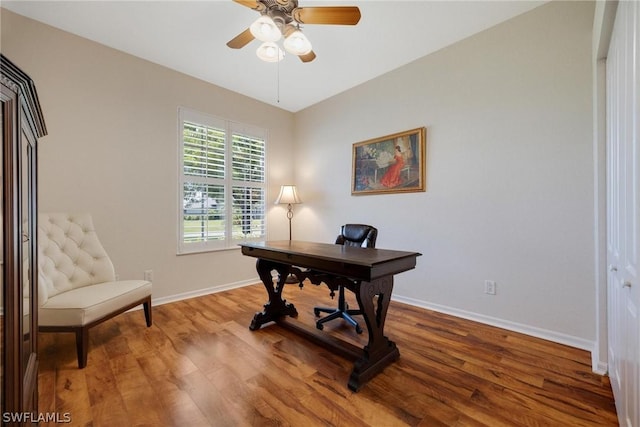 office space with hardwood / wood-style flooring and ceiling fan