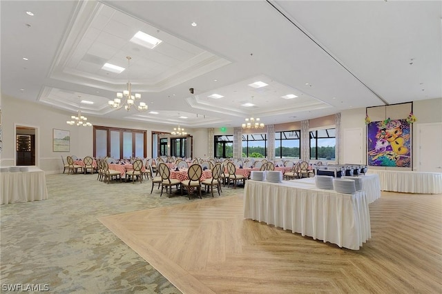 living room with light parquet floors, ornamental molding, and a raised ceiling