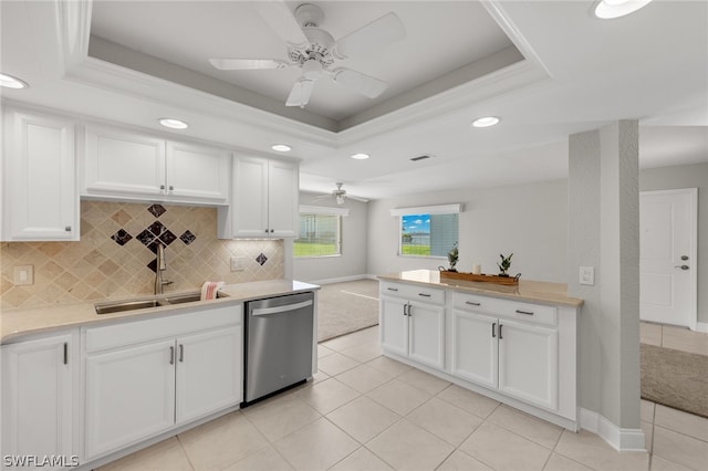 kitchen with ceiling fan, dishwasher, white cabinets, and sink