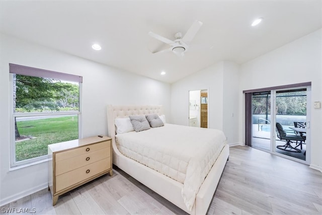 bedroom with light hardwood / wood-style floors, ceiling fan, vaulted ceiling, and access to exterior