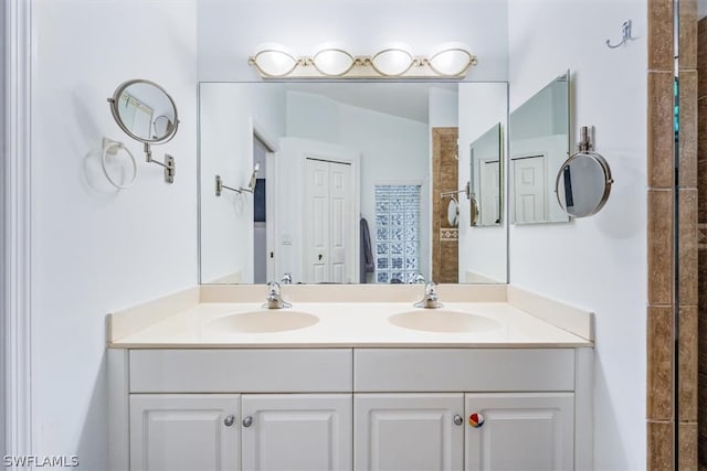 bathroom with oversized vanity and double sink