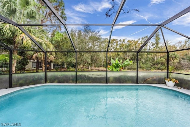 view of pool featuring a lanai