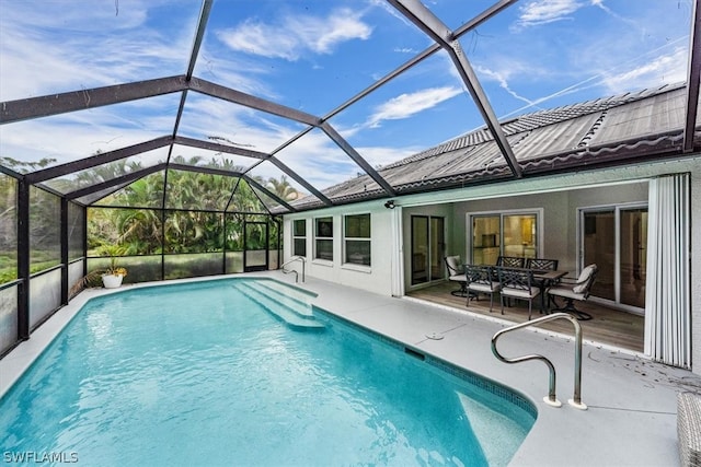 view of pool featuring a patio and a lanai