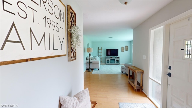 hall featuring light hardwood / wood-style flooring