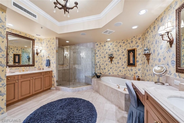 bathroom with a notable chandelier, vanity, ornamental molding, and independent shower and bath