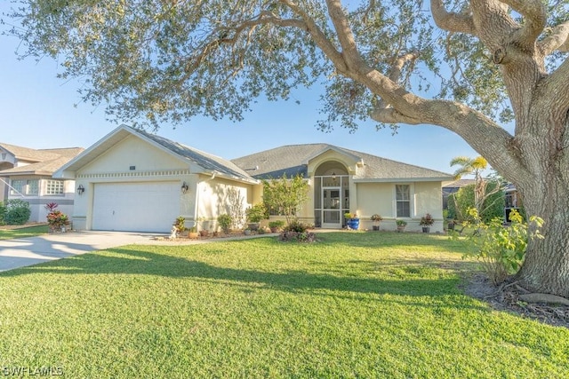 ranch-style house featuring a garage and a front lawn