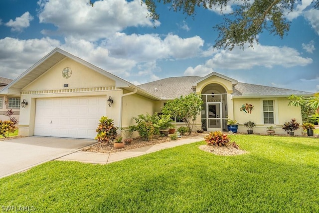 single story home with a garage and a front lawn