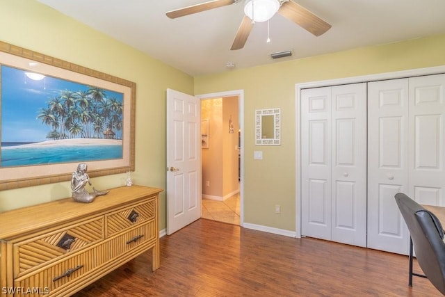 home office featuring ceiling fan and hardwood / wood-style floors