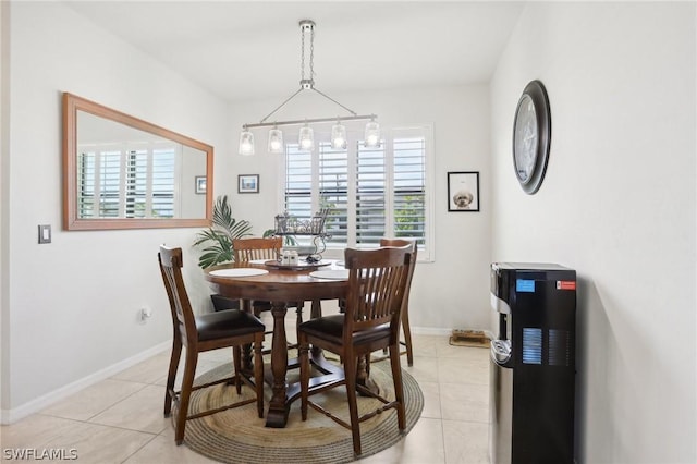 dining room featuring light tile patterned flooring