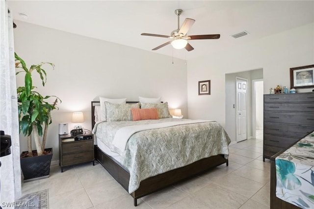 bedroom featuring ceiling fan and light tile patterned flooring