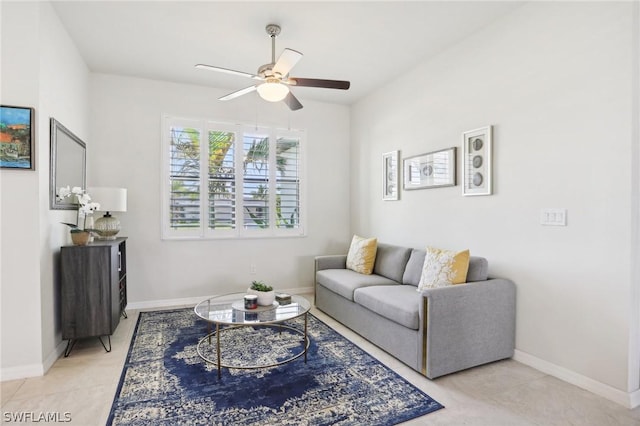 tiled living room with ceiling fan