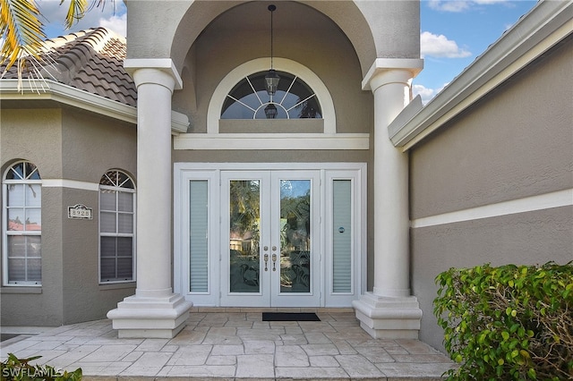 doorway to property with french doors