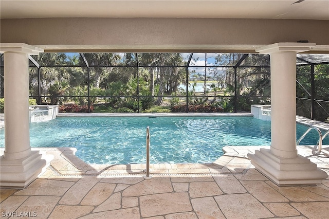 view of swimming pool with pool water feature