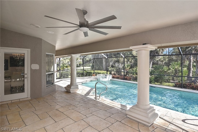 view of pool featuring a lanai, a patio area, and ceiling fan