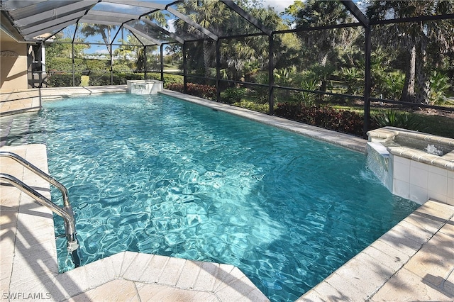 view of pool featuring pool water feature and glass enclosure