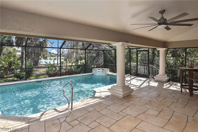 view of pool featuring ceiling fan, a patio area, and a lanai