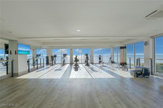 interior space featuring visible vents and a water view