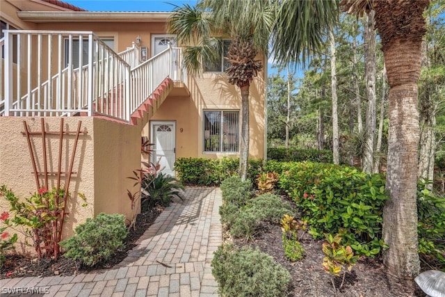 exterior space featuring stucco siding