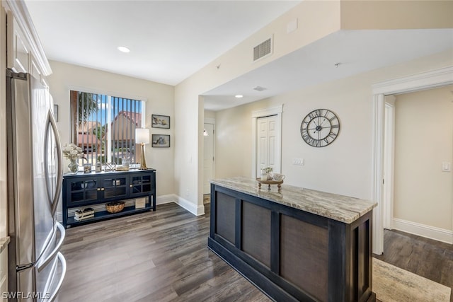 corridor featuring dark hardwood / wood-style floors