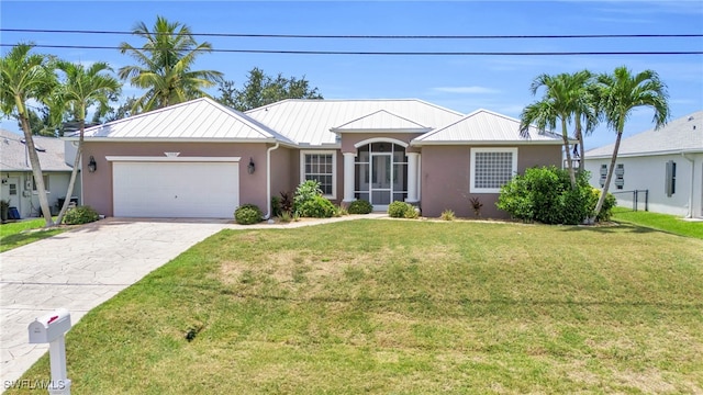 ranch-style home with a front yard and a garage