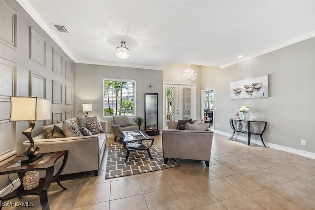 tiled living room featuring french doors, a notable chandelier, and ornamental molding