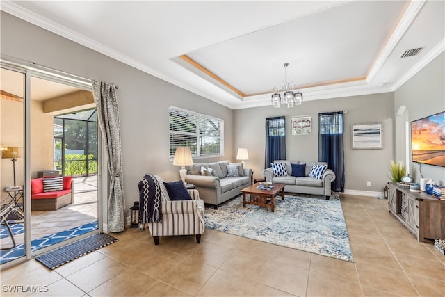 living room featuring a notable chandelier, plenty of natural light, light tile patterned floors, and crown molding