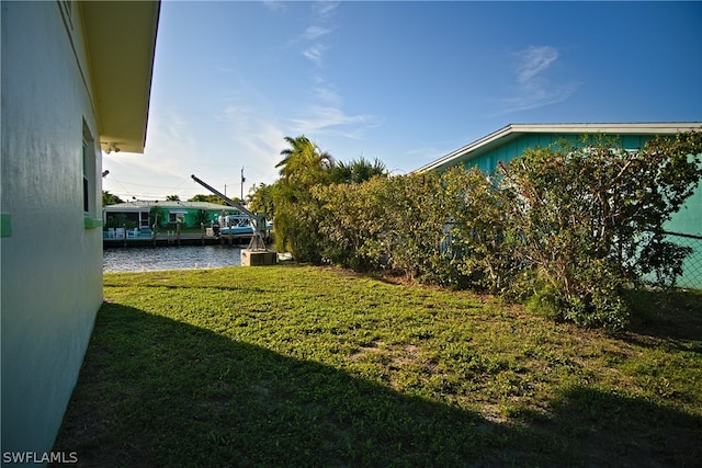 view of yard featuring a water view