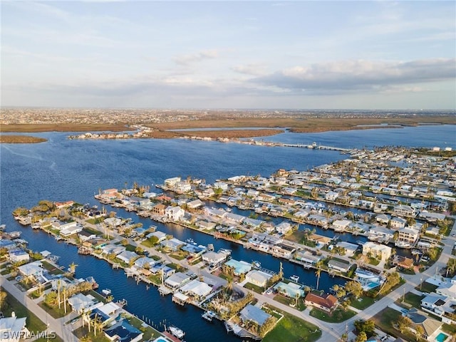 aerial view with a water view and a residential view