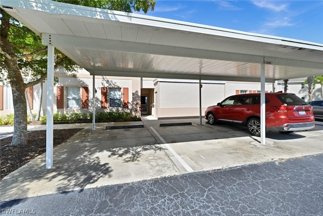 view of parking with a carport