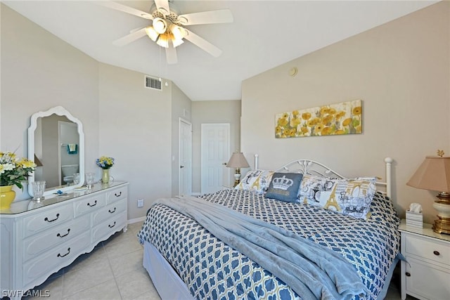 bedroom featuring light tile patterned floors, a closet, and ceiling fan