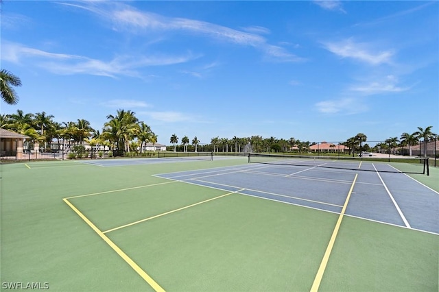 view of sport court featuring basketball hoop