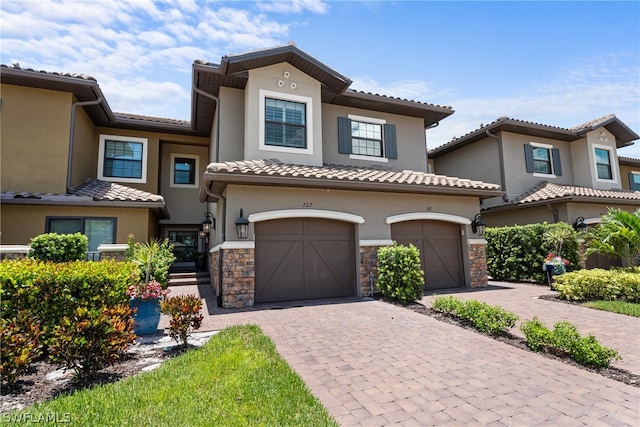 view of front of home with a garage