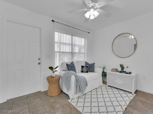 living room with ceiling fan