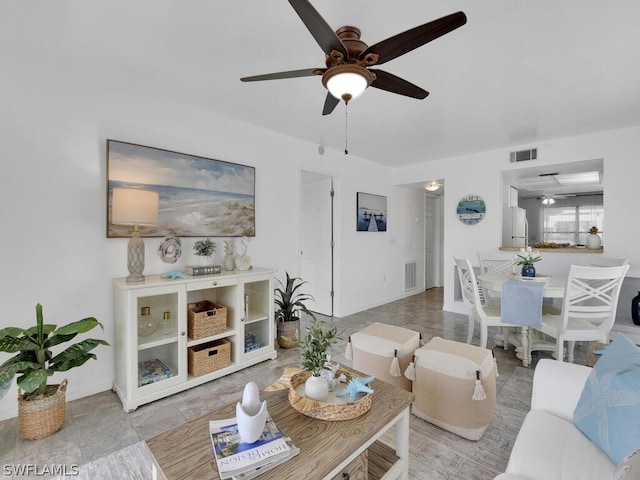 living room with ceiling fan