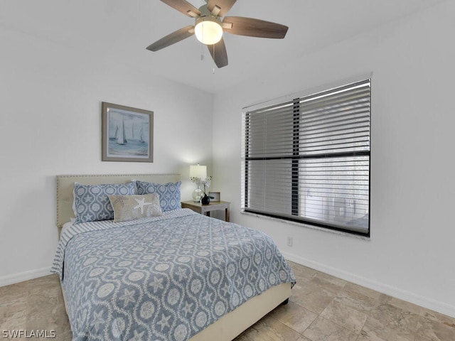 bedroom featuring ceiling fan