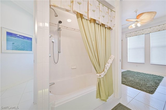 bathroom with tile patterned floors, ceiling fan, baseboards, and shower / bath combo with shower curtain