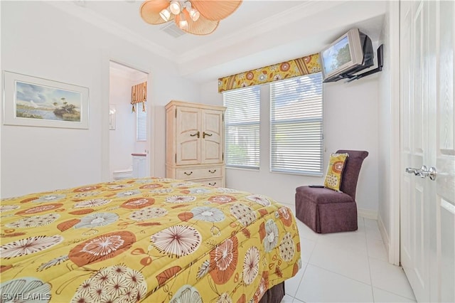 bedroom featuring visible vents, crown molding, ensuite bath, and light tile patterned floors