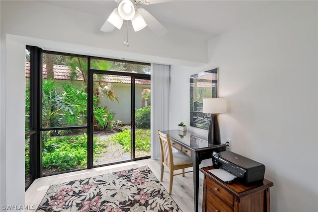 office area with a wealth of natural light and ceiling fan