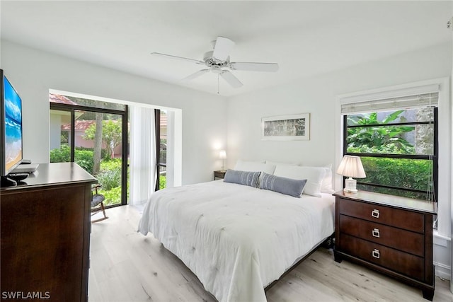 bedroom with ceiling fan, access to exterior, and light wood-type flooring