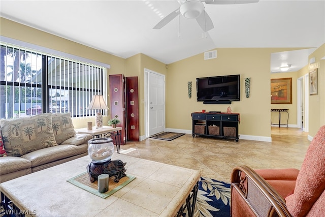 tiled living room featuring vaulted ceiling and ceiling fan